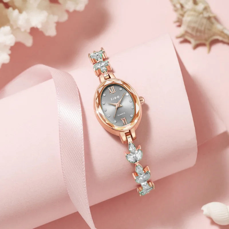 Montre pour femmes, de luxe , sertie de diamants, avec motif trèfle, montre ovale imperméable.